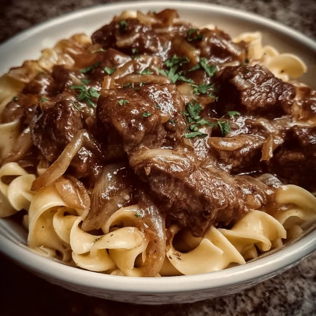 Delicious French onion beef served with noodles in a rich broth.